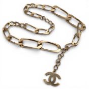 Vintage Chanel Ladies metal Fashion Belt, gold tone, gold plated with Chanel logo, adjustable size