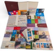 A large quantity of Jersey and Guernsey Mint Stamps presentation packs, and loose albums mostly