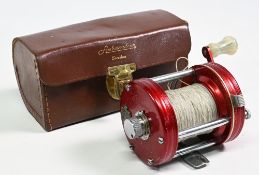 ABU Ambassadeur 6000 multiplier reel in red finish, no foot stamp apparent, counter wight handle,