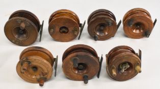 Collection of 7 wood/brass Nottingham starback reels, sizes range 3”-4”, four with ratchet