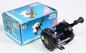 Abu Garcia Ambassadeur SIX multiplier reel in black finish, foot stamped 89-**89-90, twin handled,