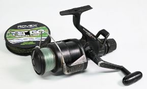 Shimano Aero 4000 baitrunner reel, rear drag, free spool, well used, working and a spool of Rovex