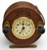 Peetz fishing reel alarm clock, 5” diameter, battery compartment and controls to rear, every