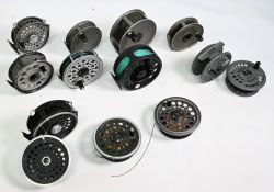 A collection of fly reels and spools by J W Young, Shakespeare, Intrepid & Daiwa, all working well