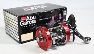 ABU Garcia Ambassadeur C7001 multiplier reel in red finish, star drag, counter balanced handle,