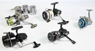 A collection of fixed spool reels, as follows: 1x Abu Cardinal 77 saltwater proof LHW bail (a little
