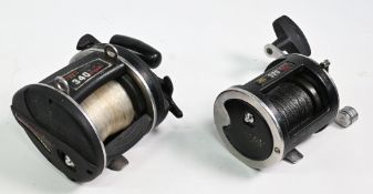 2x Penn multiplier reels to include a 340 GTI in graphite construction, large power handle, together
