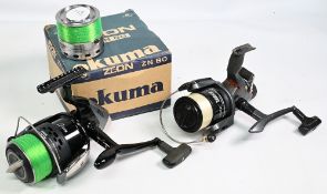 Okuma Zeon 80 large fixed spool spinning reel, front drag, spare spool and a Zebco Topic long