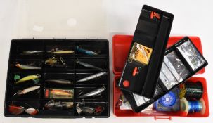 Selection of predator lures, plastic plugs, metal spoons, and a box of general terminal tackle. (2)