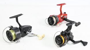 3x Fixed spool reels to incl a Shakespeare Firebird 36 in red finish with reversible handle, Azur No