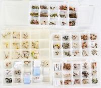A collection of clear 15 section fly boxes with a huge selection of trout dry and wet flies. Look