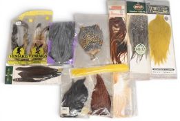 Collection of capes and wings, as follows: 1x Whiting rooster cape, golden olive, looks unused. 1x