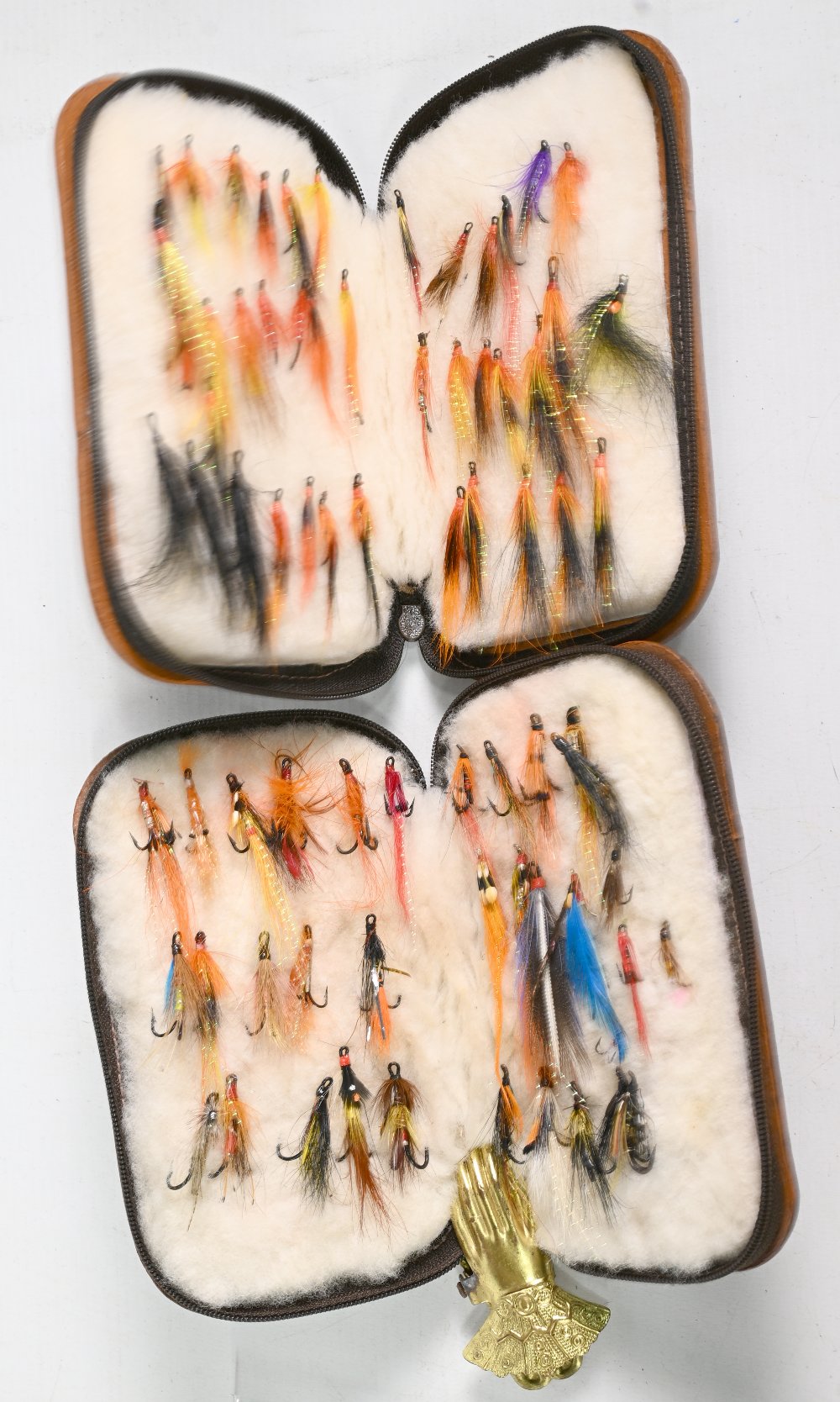 Pair of Hardy leather zipped wool lined fly cases, 6” x 4”, one looks unused and one shows signs