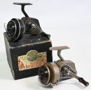 2x Youngs Ambidex fixed spool reels to include a 1st Model casting reel in black finish with