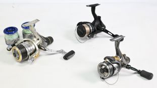Shimano Fixed spool reels (3) featuring Baitrunner ST 2500FB in black finish, another with Seido
