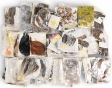 Bundles of tying material, as follows: Golden pheasant capes, peacock, moorhen flank feathers,