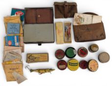 Period Fishing Tackle Lures, to include Mucilin tins, wallets of sea hooks, trace, Japanned Devon