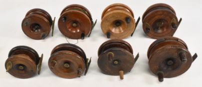 8x Nottingham wood/brass cast spineback reels, sizes 3”-4”, a mix of shallow/deep drum styles,