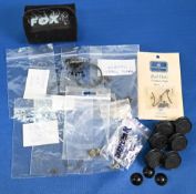 Collection of Hardy fly reel spare parts, as follows: 6x plastic spool cog covers. 3x scarce spindle