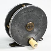 Hardy Bros Field 3 1/8” alloy fly reel with rod in hand and oval maker’s logo, engraved initials ‘