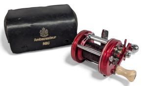 Early Abu Ambassadeur 6000 multiplier reel, foot stamp 100400, white handle, star drag, free