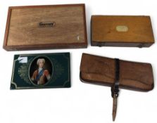 Rare Wheatley leather lure case, with outer flap, holding an assortment of plugs and lures, a