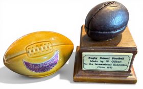 1950s and After, Pair of Small Ceramic/Resin Rugby Balls: Ceramic rugby ball-shaped wine container