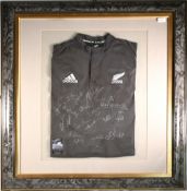 c2000 All Blacks framed signed ‘Invincibles’ Rugby Jersey: V large 41” x 36” grey marbling effect-