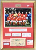 Framed and special glass picture of the England winning team shown with Bobby Moore holding the