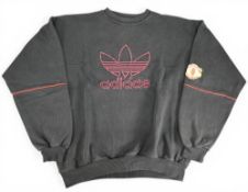 Hard to find 1990-1991 Manchester United Football Training Sweatshirt by Adidas, size 44-46 in good