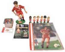 Liverpool Football Club memorabilia to include a seven Corinthian figures, a Steve McManaman