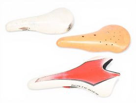 Cinelli Unica Nitor plastic Bicycle Saddle together with Selle San Marco Rolls leather bicycle