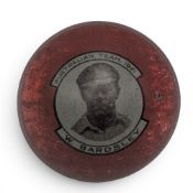 An early Match Metal Cricket Ball Tinplate Advertising Tin, printed with an image of Warren Bardsley