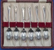 Hallmarked Cased Set of Six Silver Sheffield 1933 Golf Prize Tea or Coffee Spoons, each faced with a