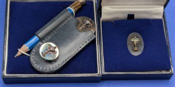 2003 PGA Cup Matches Silver Golf Set (2) - Garrard London Oval Silver Pin Badge in maker's case; and
