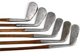 6x Trueline mussel back Golf clubs to incl 3x Irons a 1,2 and mashie, 2x putters both straight