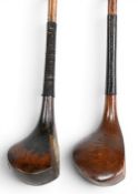 2x Late scared neck woods a brassie stamped AE Rob East Surrey with decorative central face insert