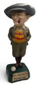 Reproduction Penfold Man Advertising Golfing Figure with pipe, on squared base with 'He played a