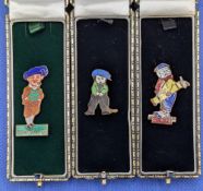 3x Enamel Golf Badges to include Dunlop Man, a Bromfield figure, together with a child golfer (3)