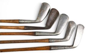 5x Various Golf irons with various designs incl a diamond back cleek with deep etched central face