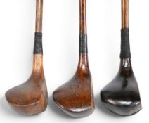 3x Socket neck woods in stained persimmon incl a Burrows Junior driver with central fibre insert,