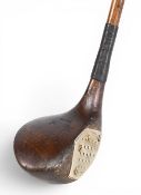 The Dint silver brassie in dark stained beechwood with integral sole and face insert stamped with