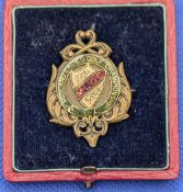 1910 Midland Counties Ladies Golf Association Enamel MLCC Badge, in original fitted case, brass,