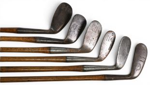Selection of 6x lofted golf irons incl Shell stamped round back pitcher with narrow oval head,