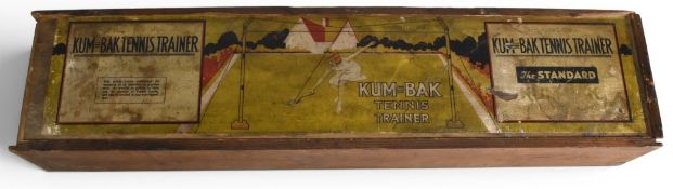 Period original Kum Bak Tennis Triner Set, in wooden box with decorative paper label, lid looking