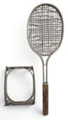 A Metallo Aluminium framed Tennis Racket - worn gut strings, cork handle in an unusual John Watts