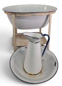 Period white enamel Baby Bath, on metal stands with enamel bowl and jug, made by Jones Bros