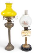 2x Vintage Oil Lamps, a brass example with a fine column, and a Deco abstract reservoir one.