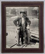 Interesting 1915 photograph of Doctor Munson with silver and bronze button fish, Oregon Salmon