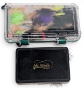 2x boxes of large salt water lures with over 60 flies. Appear to be unused. (2)